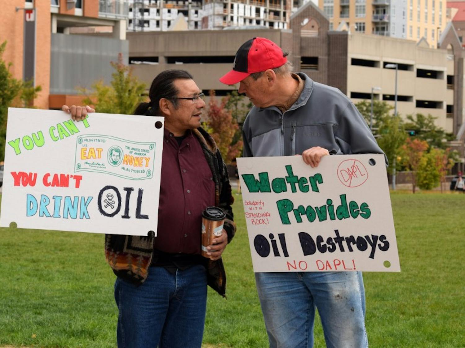 About two dozen community members rallied against the Dakota Access Pipeline Wednesday at Gordon Commons.