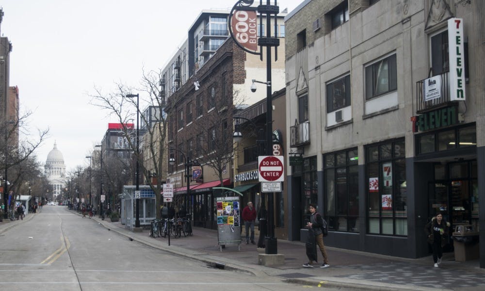 A man “half-pulled” a gun on an individual who tried to intervene in a domestic dispute that started on State Street, police said.