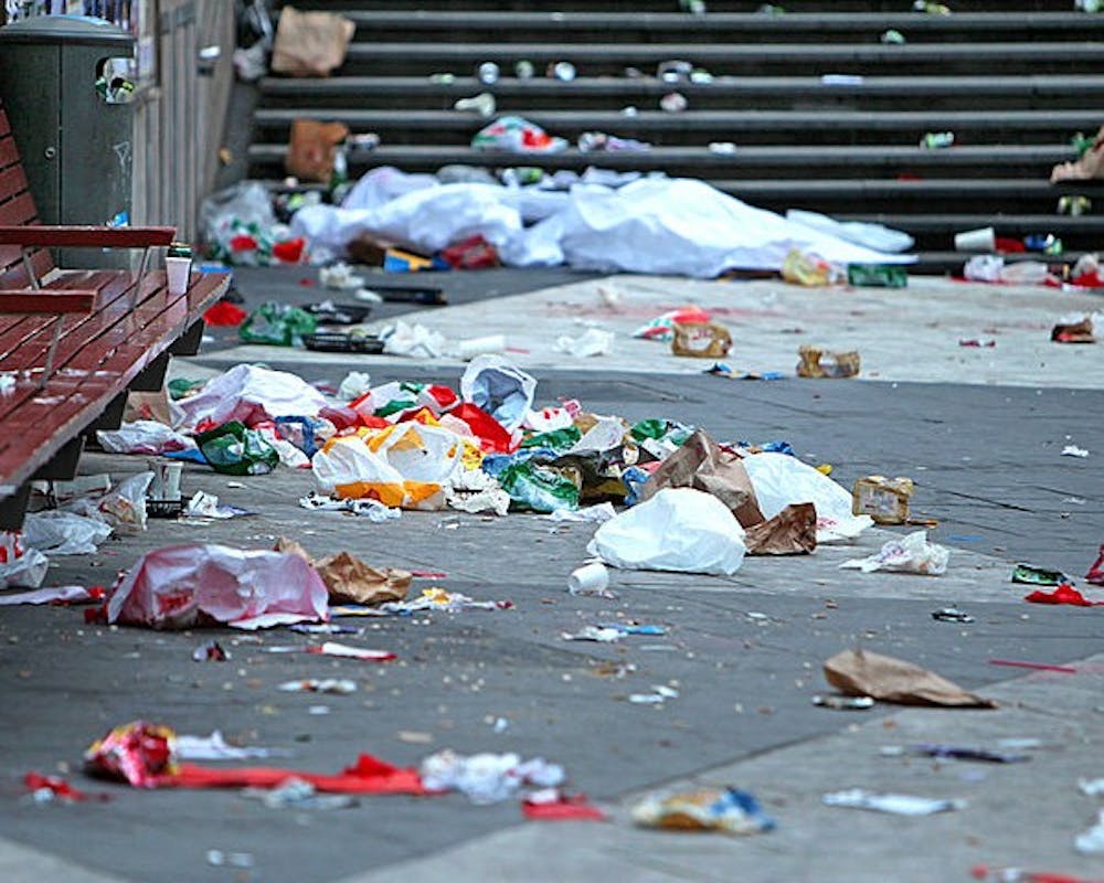 Trash litters the streets in the aftermath of big events like Freakfest.