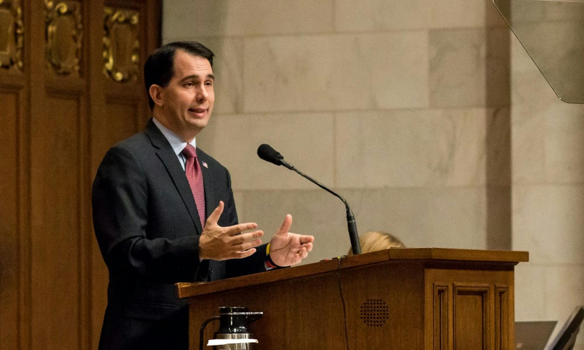 Gov. Scott Walker signed a bill into law Saturday extending the concealed carry law to protect switchblades.