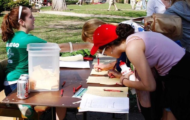UW fraternities and sororities kick off Greeks Go Green Week"" with community block party