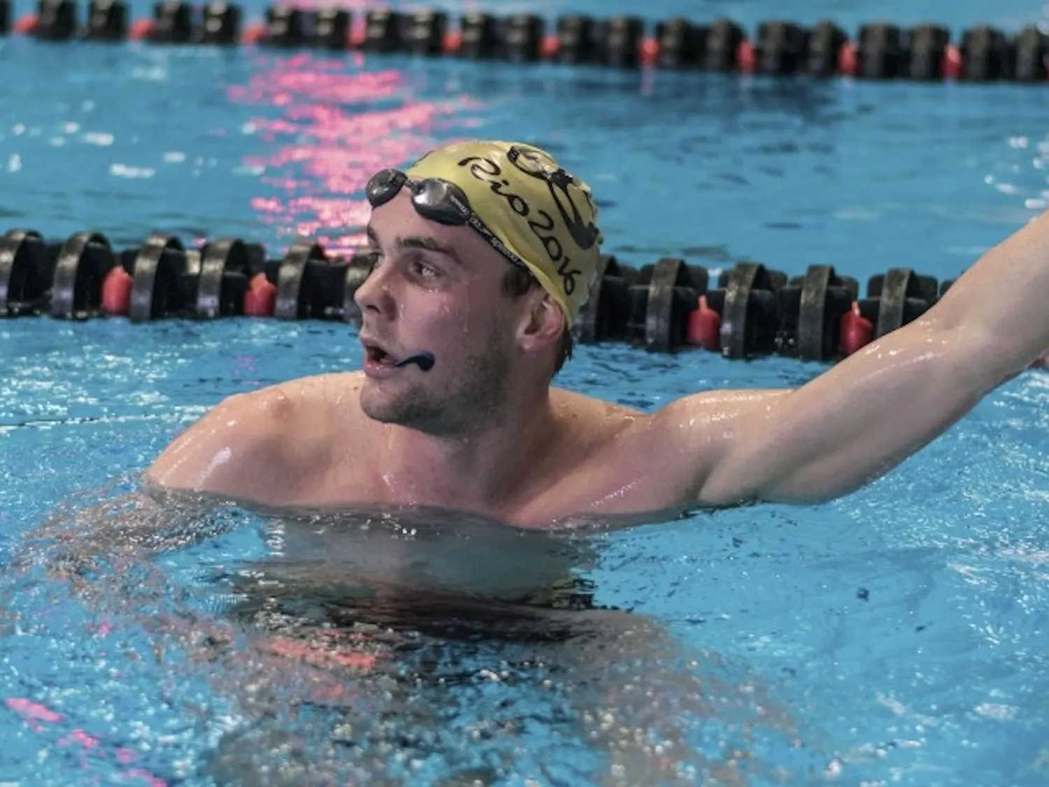 Matt Hutchins will trade in his red and white swim cap for a black and blue one when he represents New Zealand in Rio.