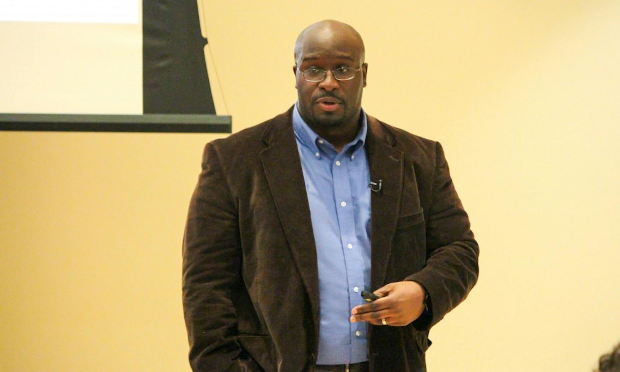 Jamein Cunningham of Portland State University discussed legal and racial relations in the 1960s and ’70s at Thursday’s Institute for Research on Poverty seminar.