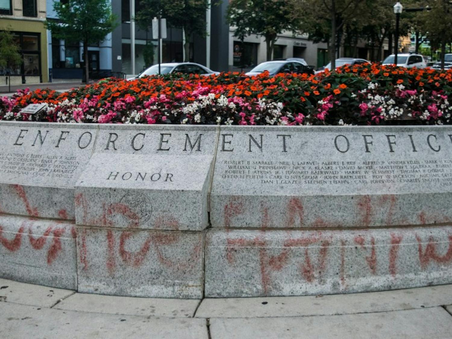 A memorial for fallen law enforcement officers was recently spray-painted with #Justice4AnthonySmith.