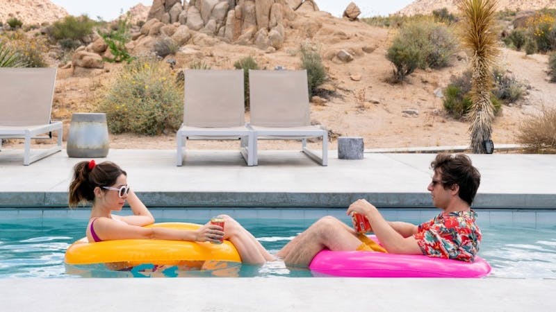 Andy Samberg and Cristin Milioti fall into a never-ending repetitive reality in new Hulu rom-com "Palm Springs."
