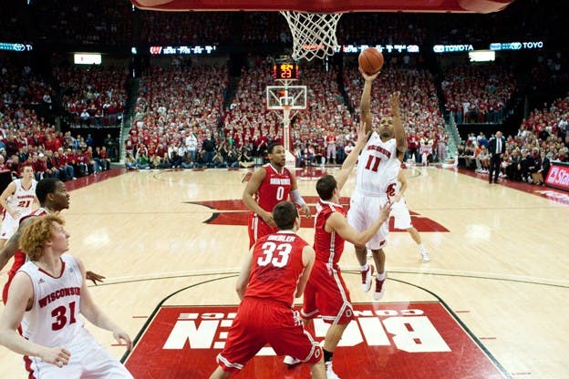 Basketball standouts Taylor and Leuer earn All-American honors