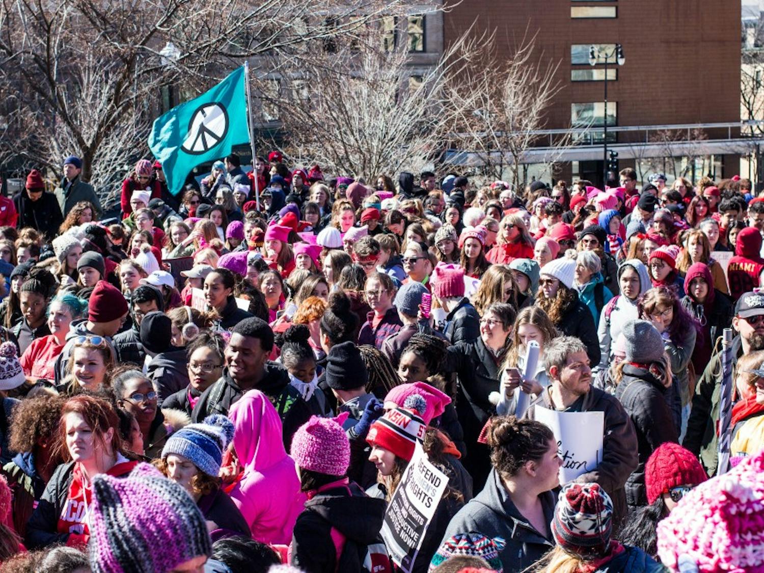 Hundreds of protesters swarmed the Capitol Wednesday to voice support for the rights of women and other marginalized people.