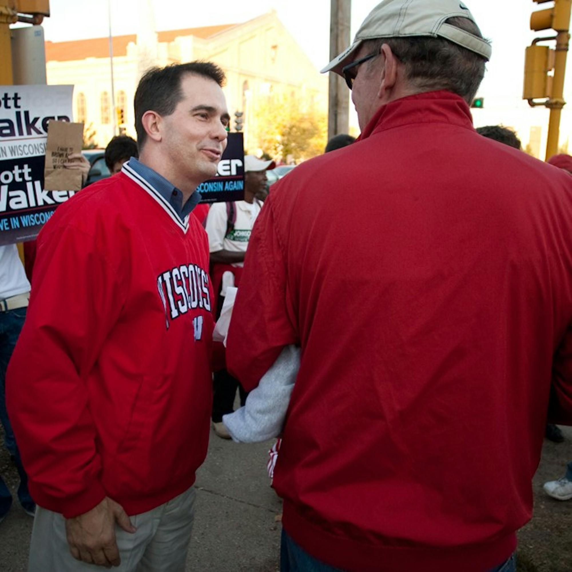 Feingold, Walker visit campus during tailgate festivities