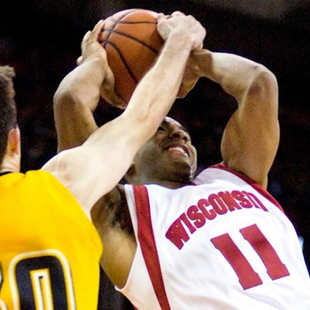 Badgers pick up overtime loss in Iowa