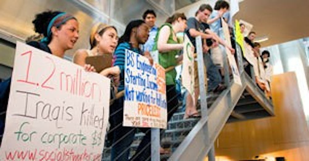 Students protest Halliburton visit