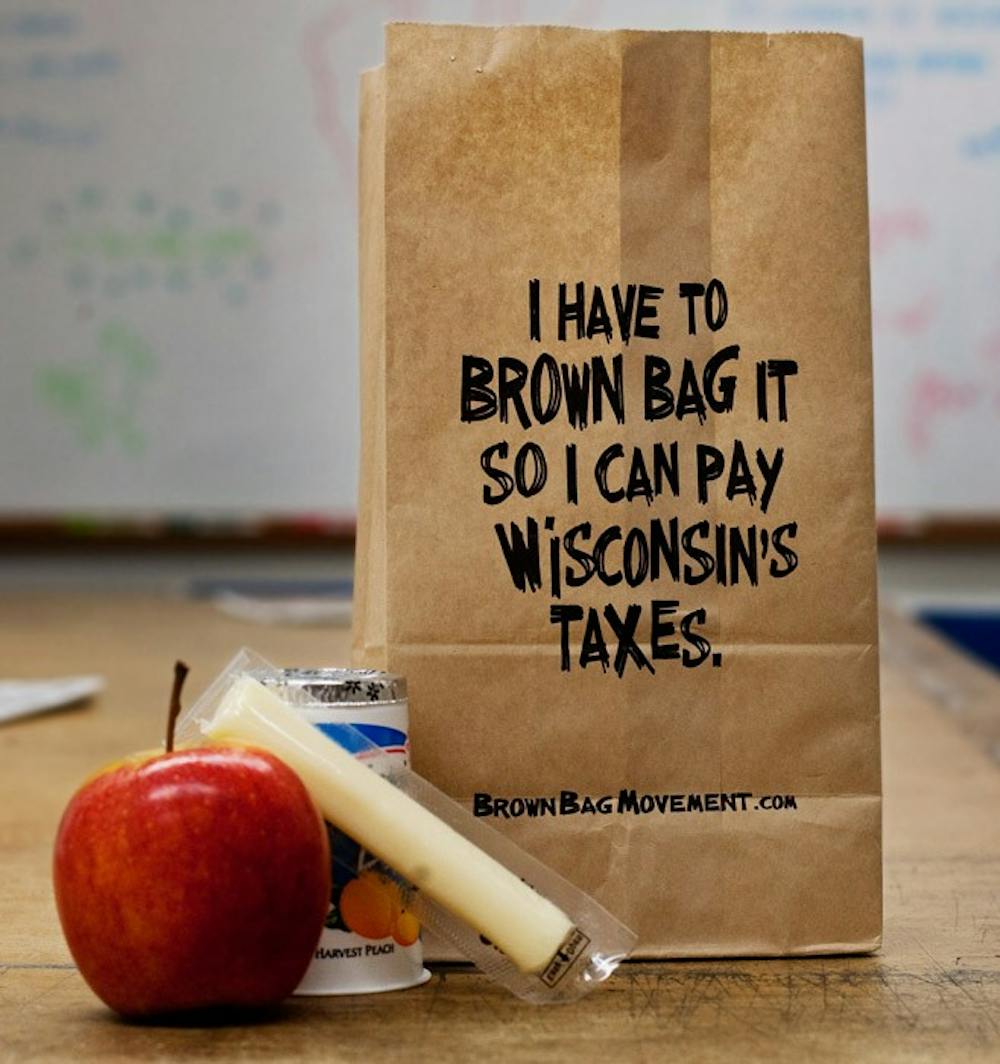 Walker recycles 'brown bag' campaign strategy, Neumann launches radio ad