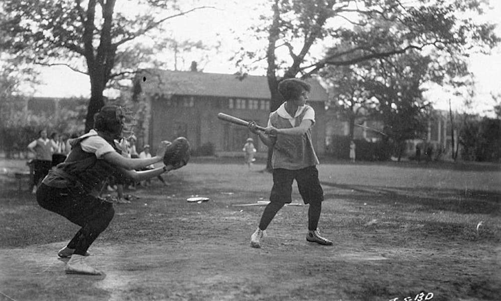 Two women utilize the makeshift baseball facilities UW-Madison had available to students in 1928.