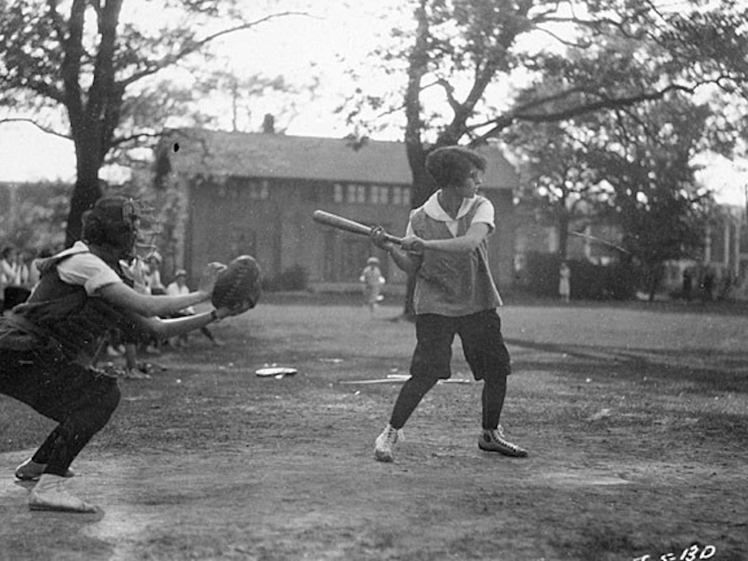 Two women utilize the makeshift baseball facilities UW-Madison had available to students in 1928.
