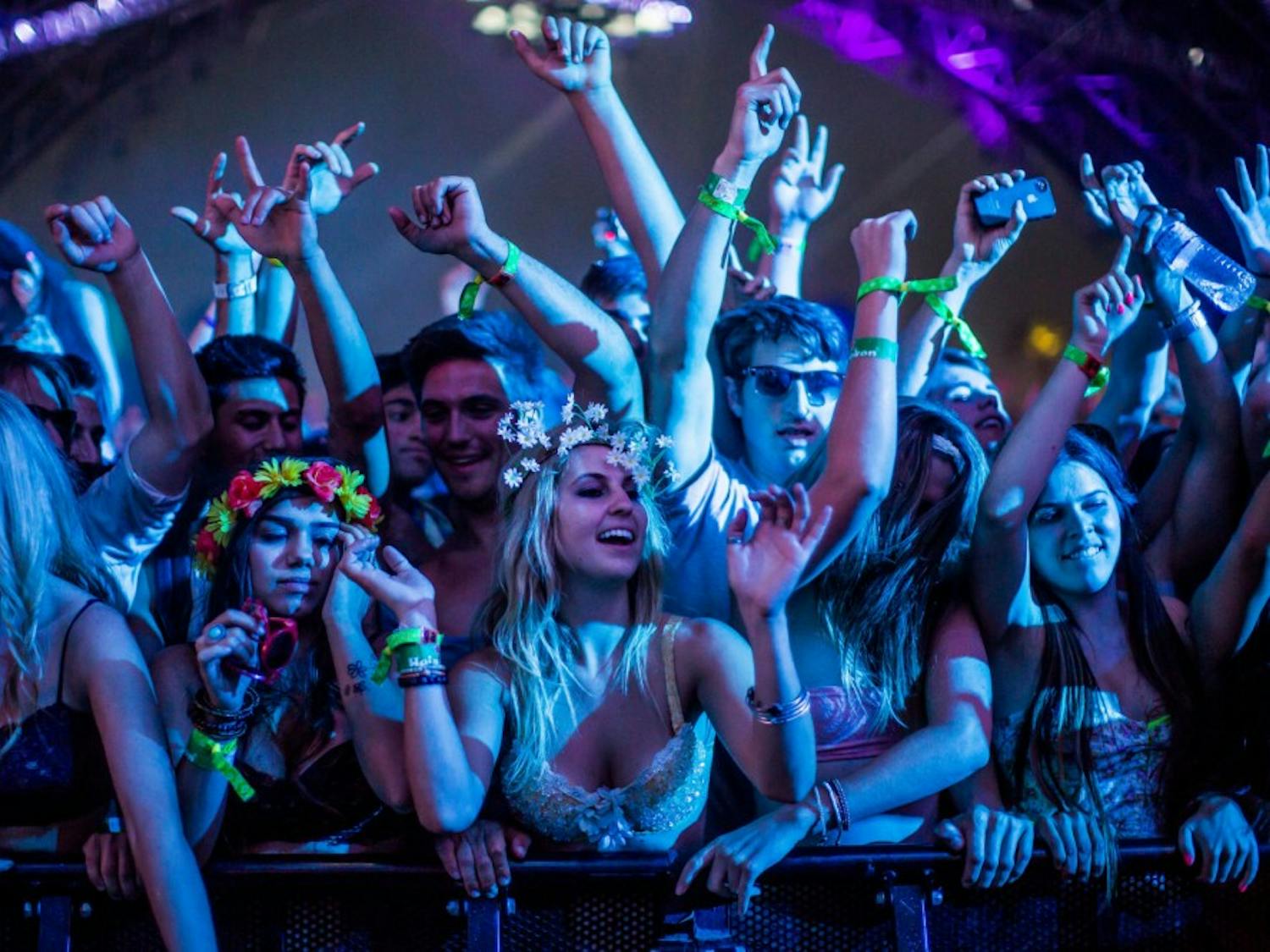 Coachella attendees enjoy contemporary music and extensive water consumption.
