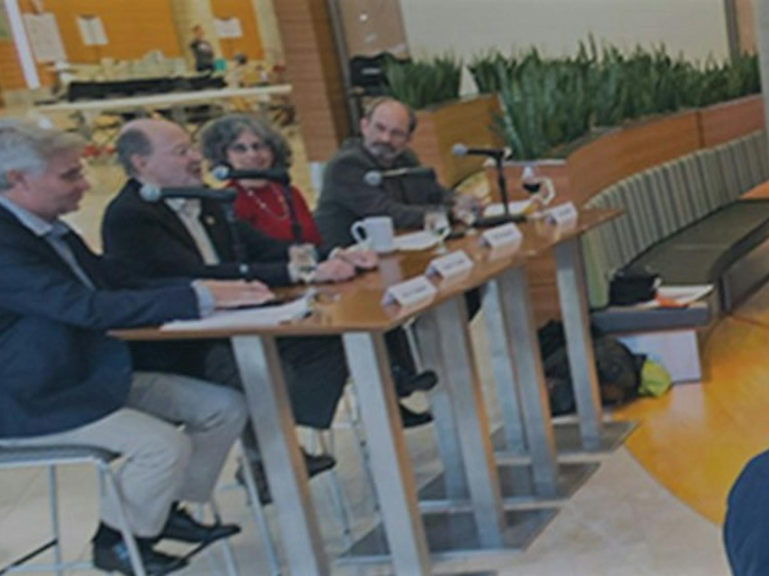 Panelist speak at one of the WID's popular science cafe sessions. Photo Courtesy of the Wisconsin Institute for Discovery.