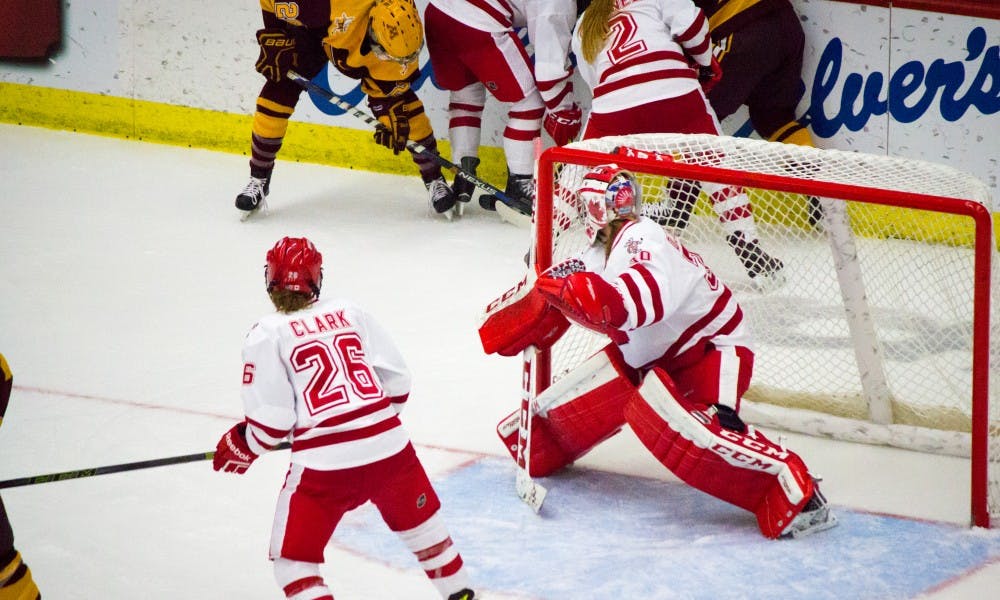 Ann-Renée Desbiens recorded her 50th career shutout, an NCAA record, as the Badgers dusted Minnesota-Duluth 8-0 Sunday.