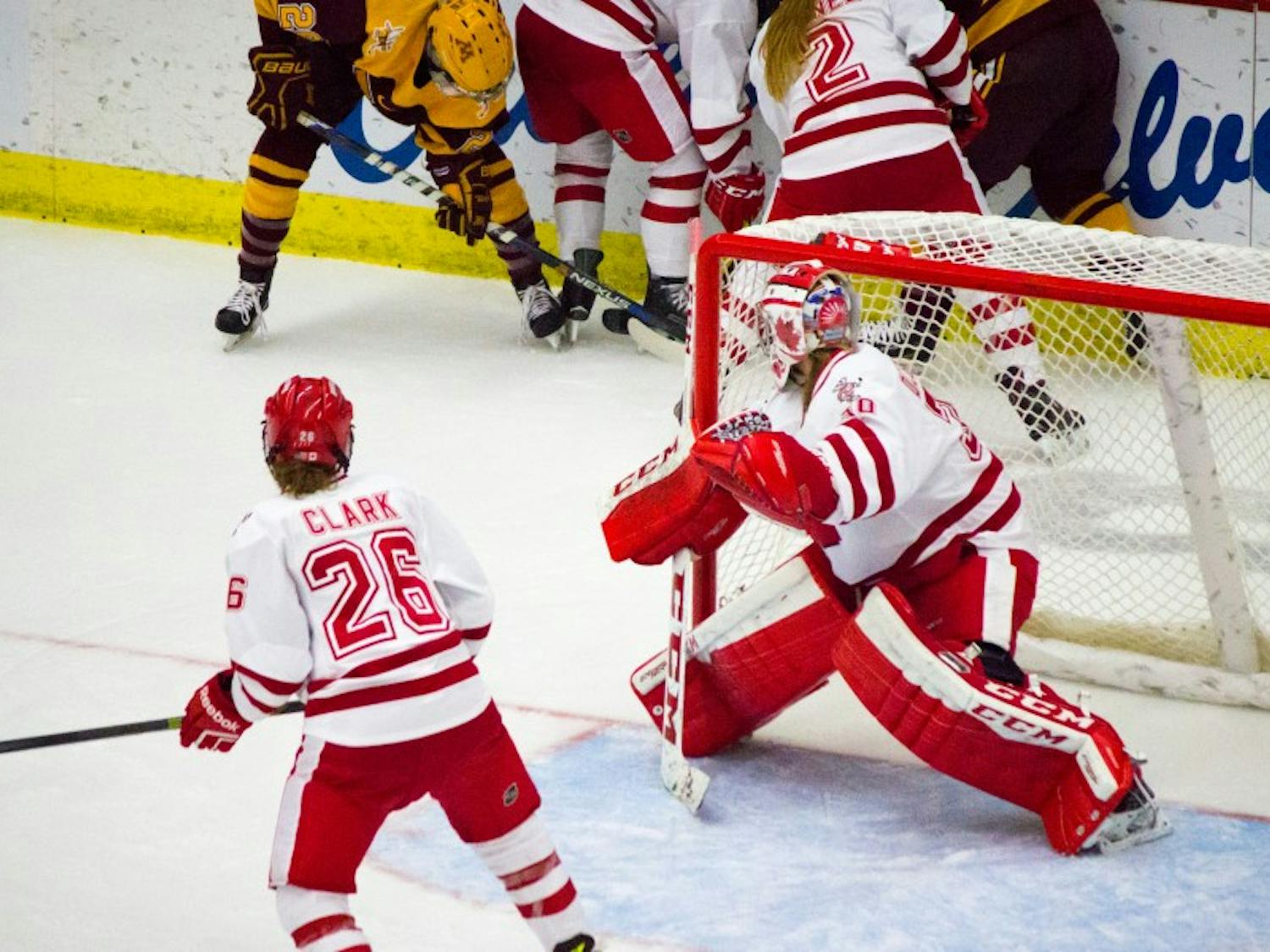 Ann-Renée Desbiens recorded her 50th career shutout, an NCAA record, as the Badgers dusted Minnesota-Duluth 8-0 Sunday.