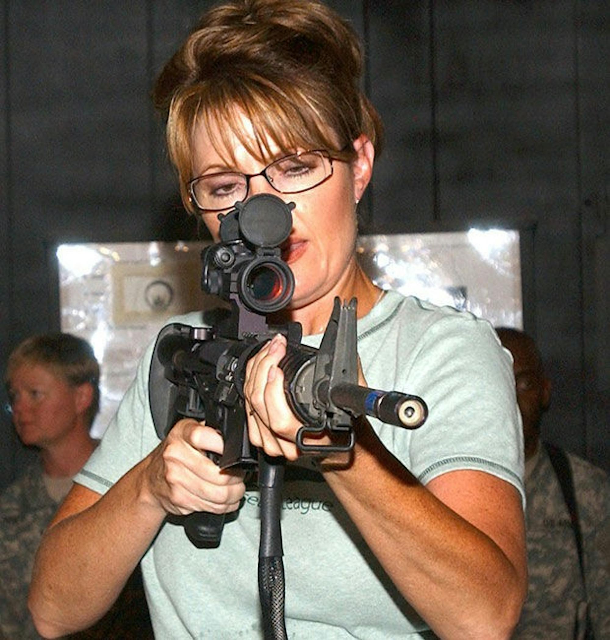 Sarah Palin wields a gun.