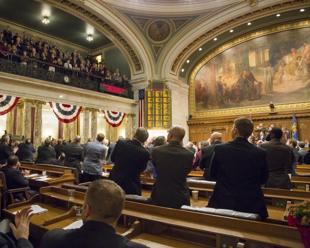 The state Assembly passed dozens of bills Tuesday as it attempts to wrap up its session by the end of the month.