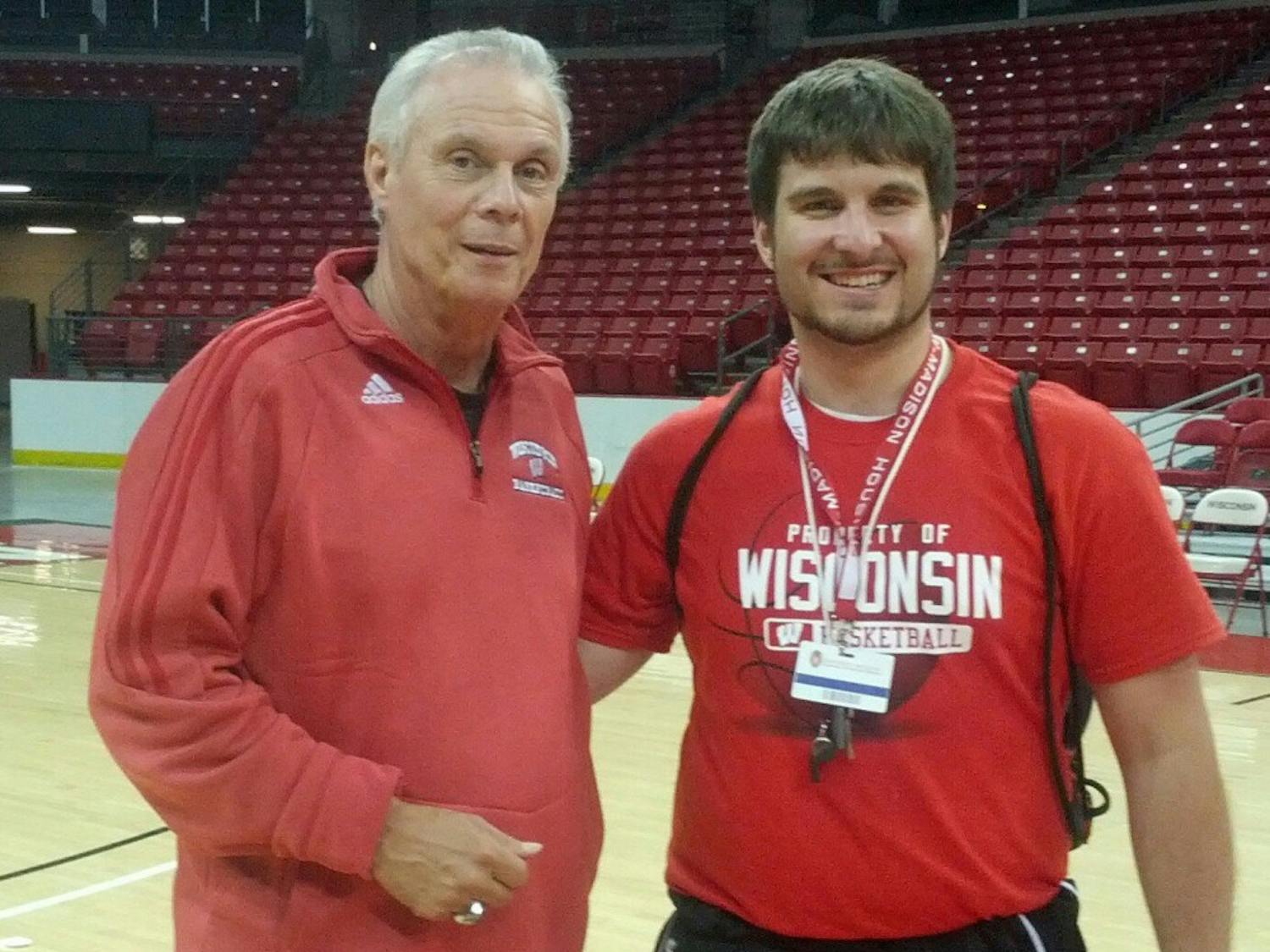 Jack Doherty, Bo Ryan’s stunt double, poses at the Kohl Center with a very easily convinced UW-Madison student.