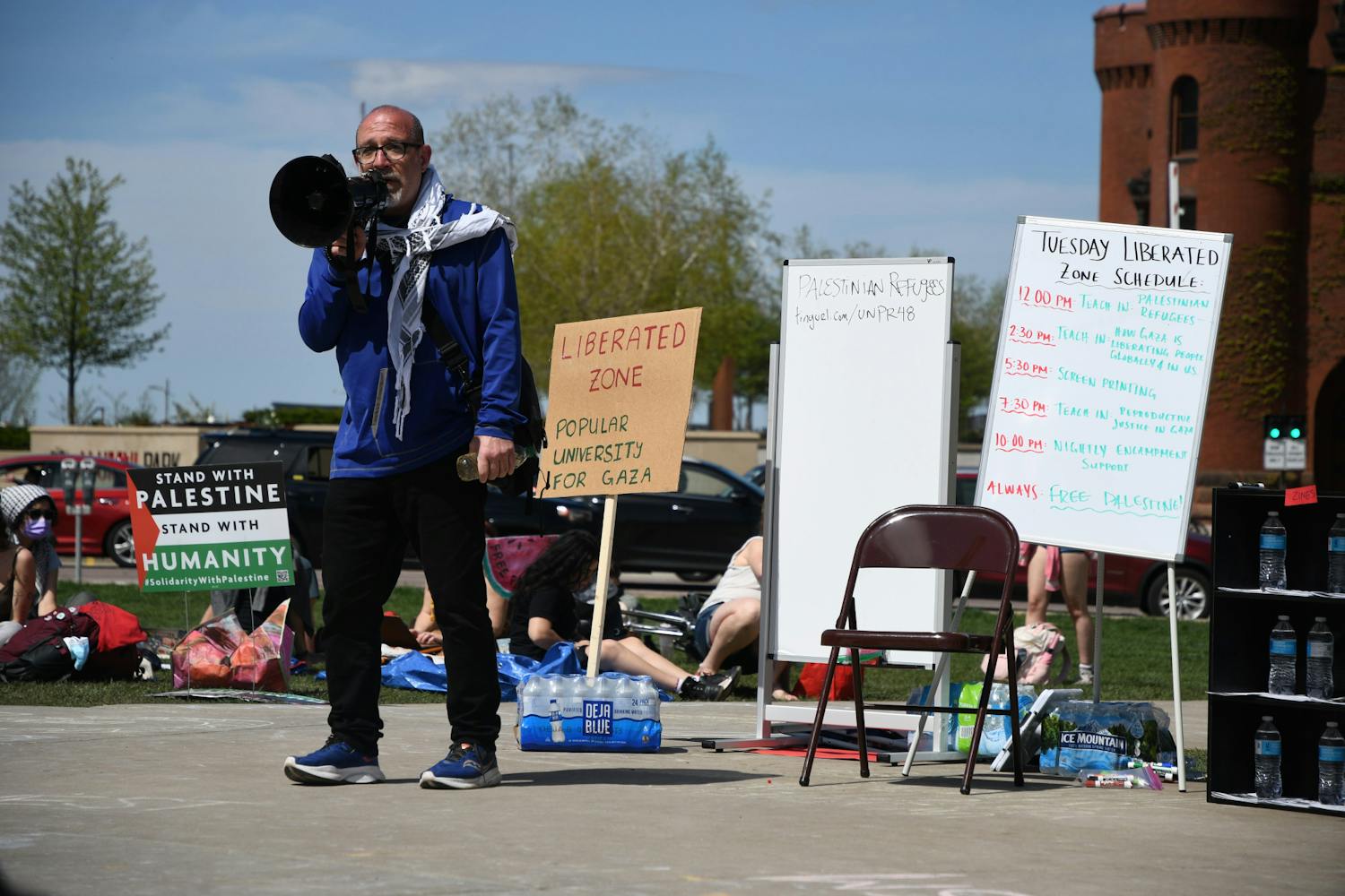 A speaker teaches "How Gaza is liberating people globally and in the US" at the pro-Palestine encampment on Library Mall on April 30, 2024. 