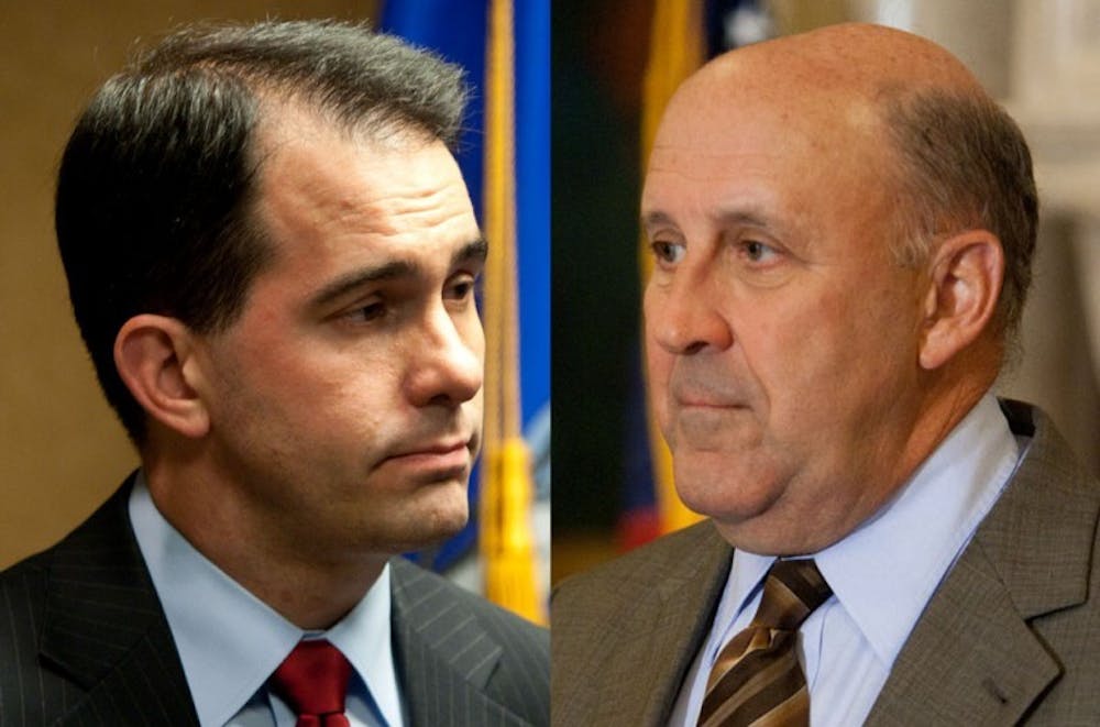 Walker, Doyle in contentious transition