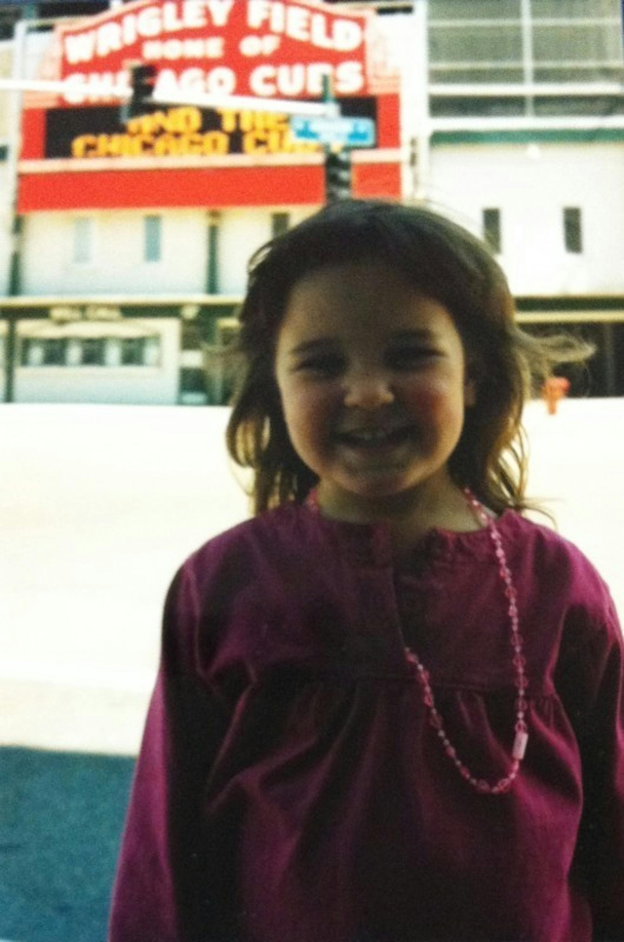 Young Jacqueline goes to Wrigley