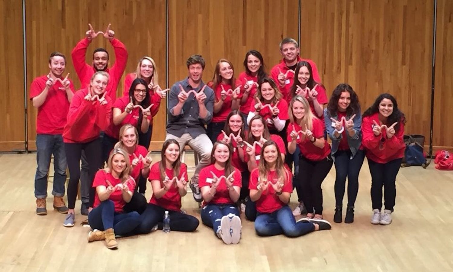 Anders Holm, a UW-Madison alumnus who stars in Comedy Central’s series, “Workaholics,” poses with members of UW-Madison Homecoming Committee after his “RED Talk” which kicked-off homecoming week.