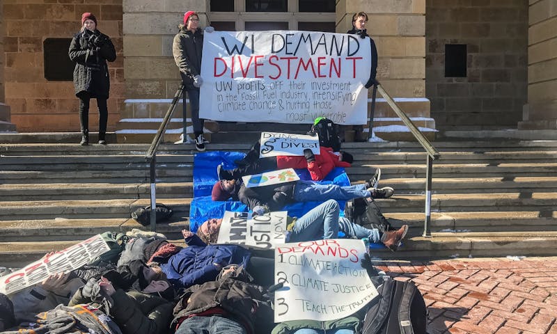 The protests in front of Bascom Hall accused UW-Madison of making significant investments in the fossil fuels industry — which have played a negative role in climate change. 