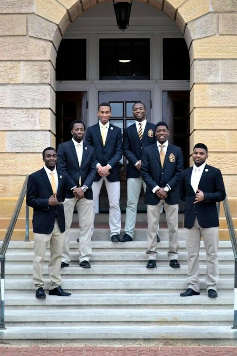 Members of Alpha Phi Alpha, one of seven Black Greek Letter Organizations at UW-Madison, pose outside Bascom Hall.