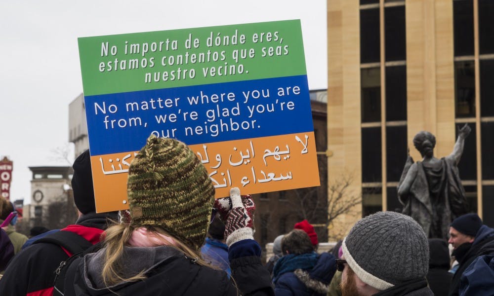 Dozens rallied at the state Capitol in May, aiming to put a spotlight on the importance of the immigrant community in Madison.&nbsp;