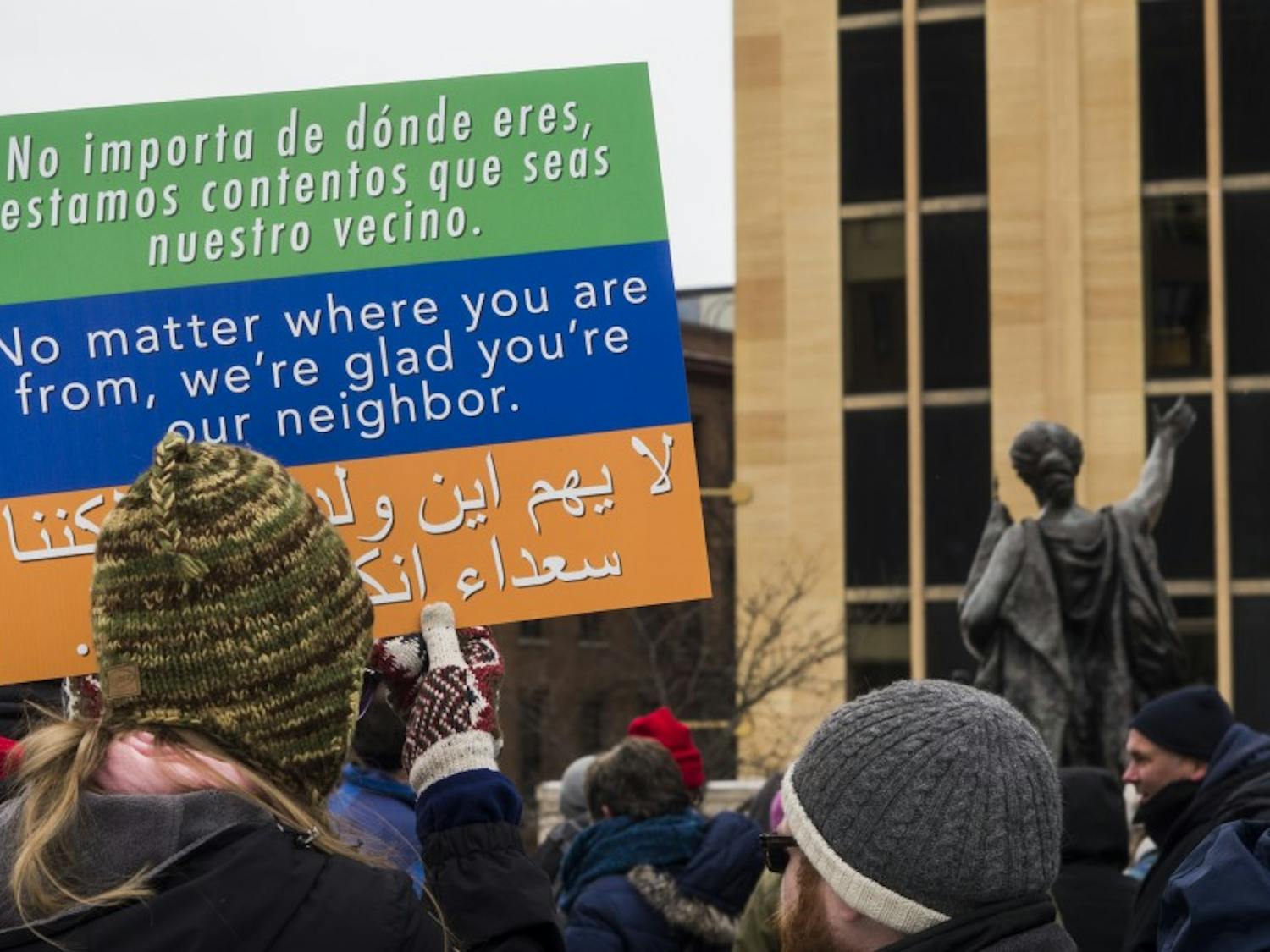 Dozens rallied at the state Capitol in May, aiming to put a spotlight on the importance of the immigrant community in Madison. 
