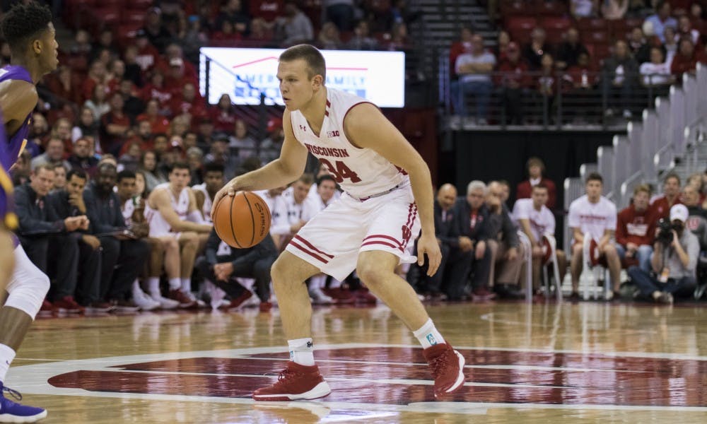 Brad Davison drew a blocking foul with two seconds to play in regulation and split a crucial pair of free throws to give UW a 81-80 victory.&nbsp;