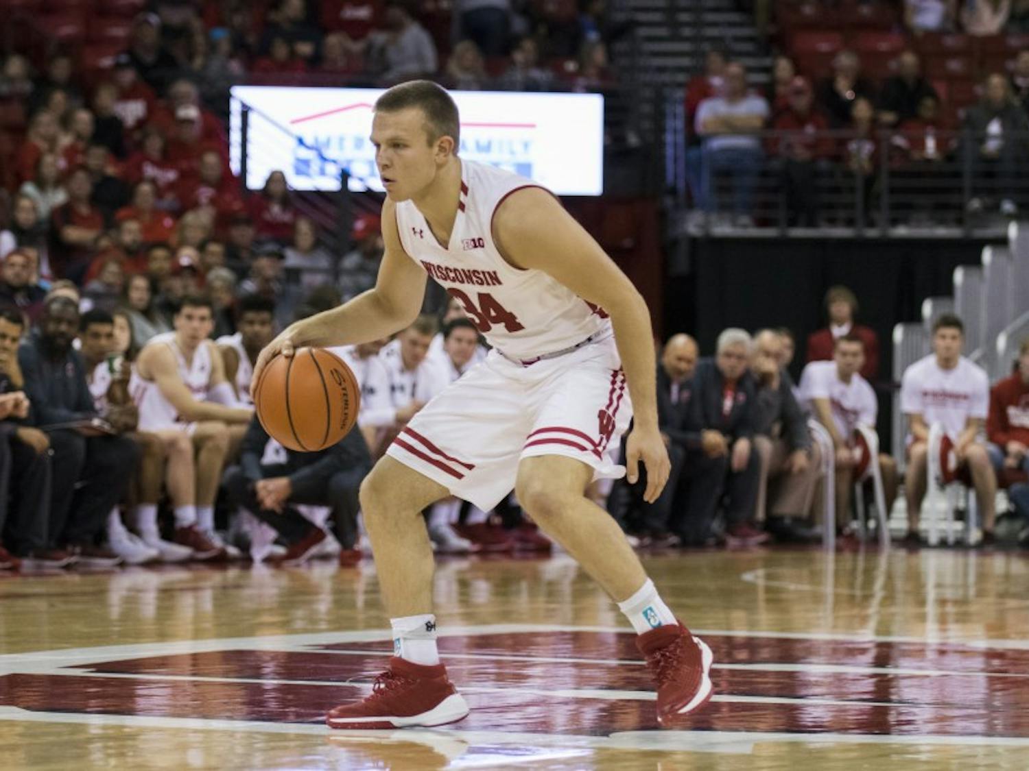 Brad Davison drew a blocking foul with two seconds to play in regulation and split a crucial pair of free throws to give UW a 81-80 victory.&nbsp;