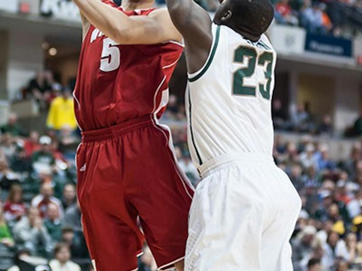 Photos: Badgers lose hold of starting lead to fall to the Spartans in the Big Ten Tournament