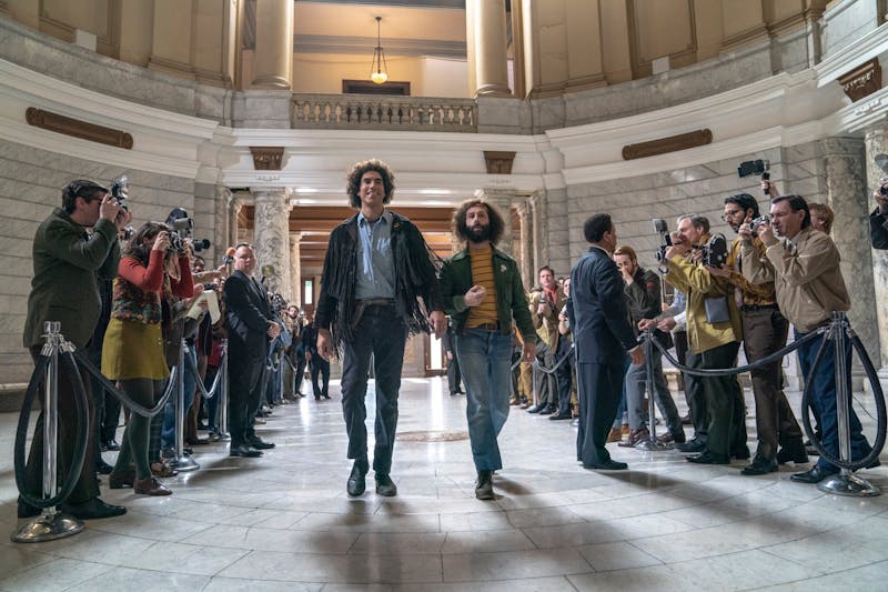 Sacha Baron Cohen and Jeremy Strong star in Aaron Sorkin's new political drama "The Trial of Chicago Seven."