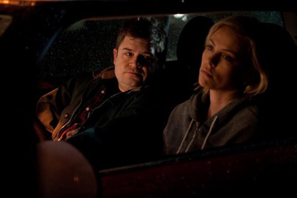 Patton Oswalt and Charlize Theron in "Young Adults"
