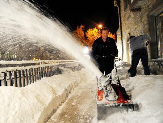 Snow business: Classes continue as Madison gets five more inches