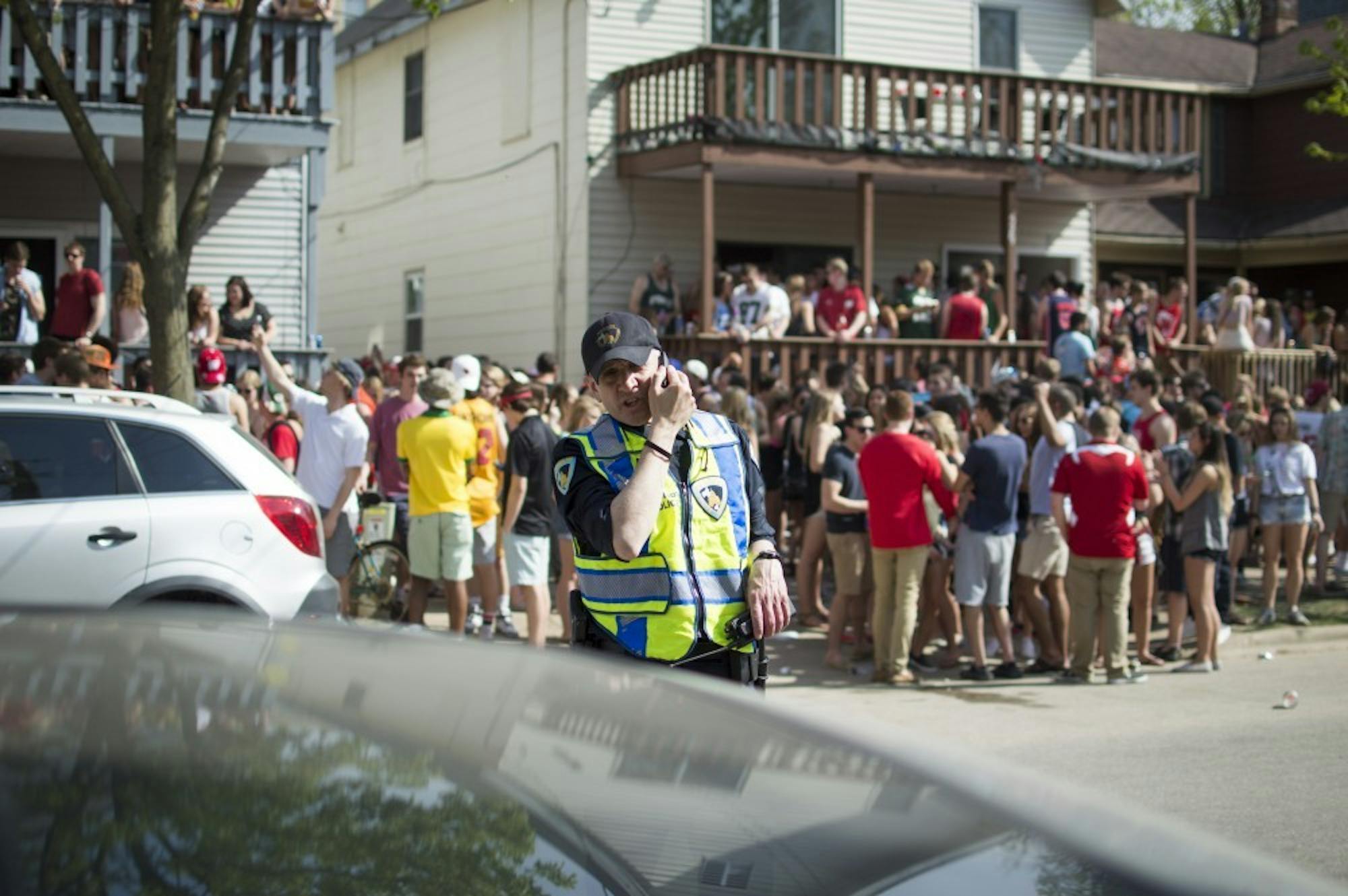 Photo of a police officer monitoring the Mifflin Block Party.