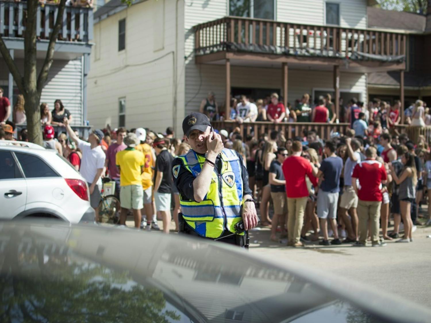Photo of a police officer monitoring the Mifflin Block Party.