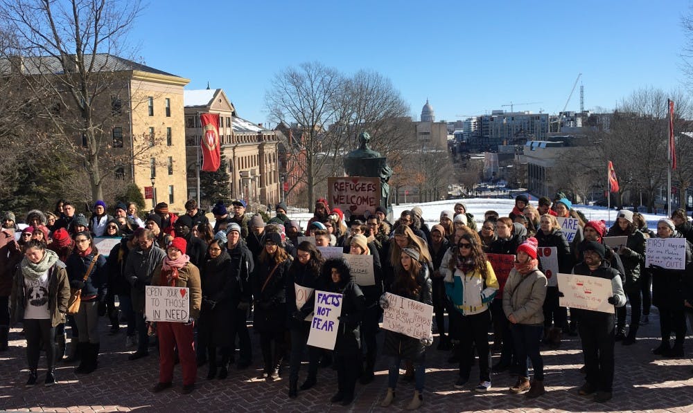 UW-Madison students braved the cold Friday and&nbsp;rallied on Bascom Hill to show support for refugees.