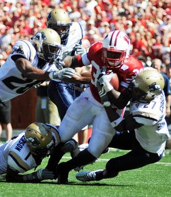 Badgers run through Akron in season opener