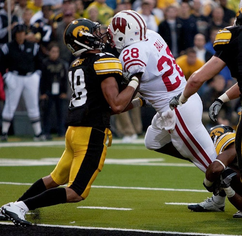Badgers overcome injuries, late deficit to beat Hawkeyes