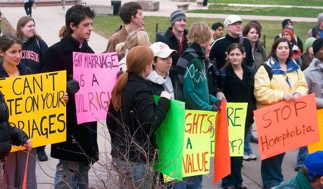 Judge rules challenge to gay marriage ban can continue