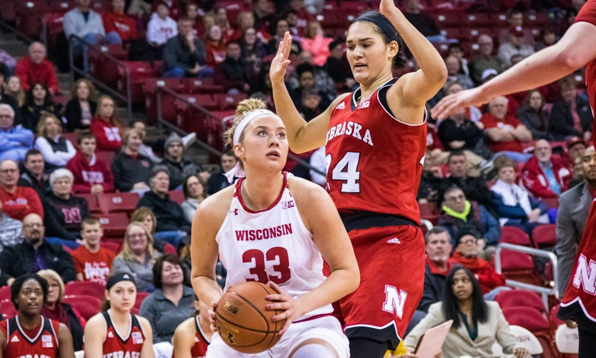 Courtney Fredrickson tied a career-high with 18 points and set a career-high with 14 rebounds, but UW still fell to Minnesota.