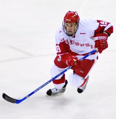 Wisconsin moves into fourth place in WCHA
