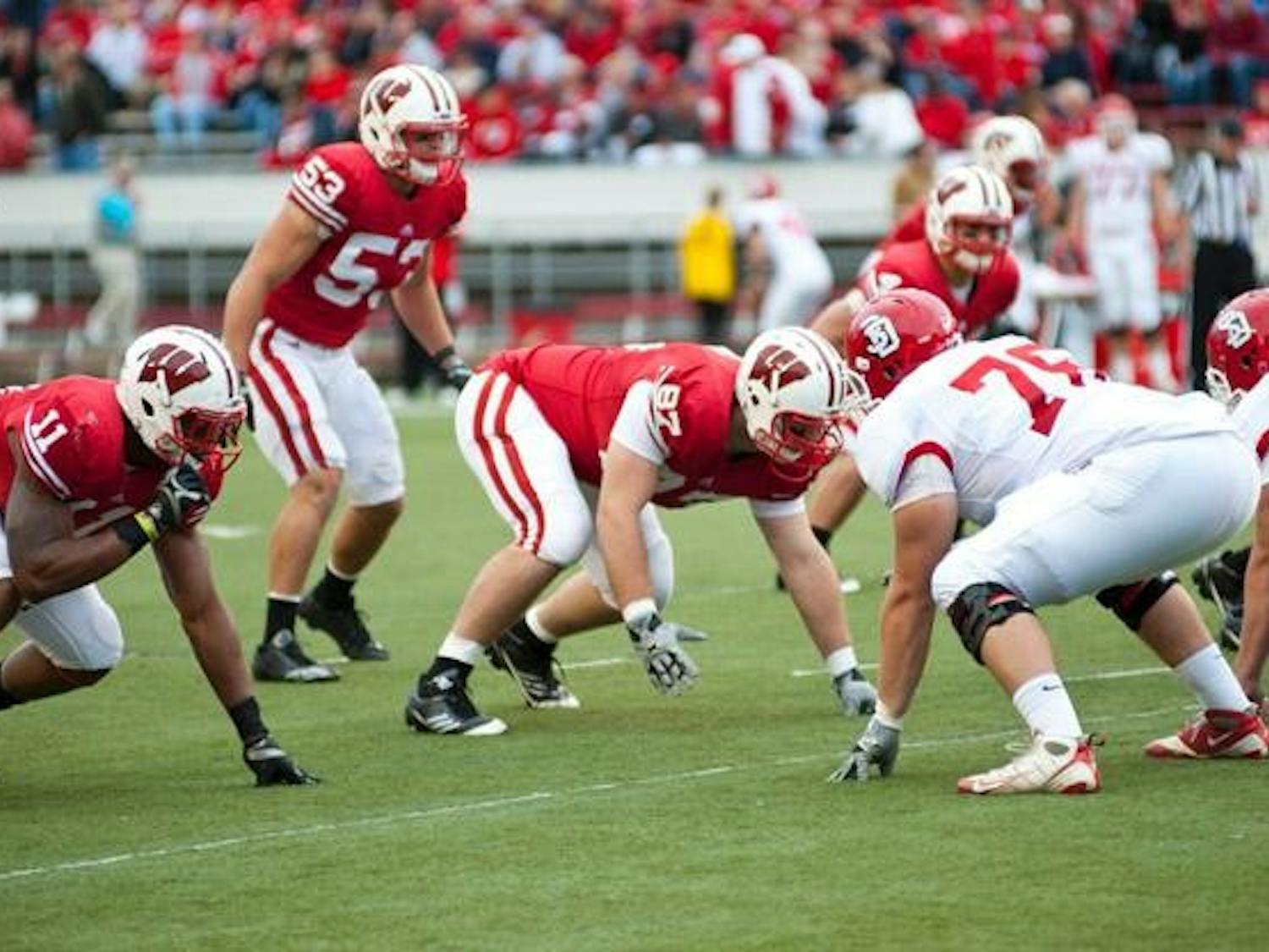 UW defensive line has risen to the occasion