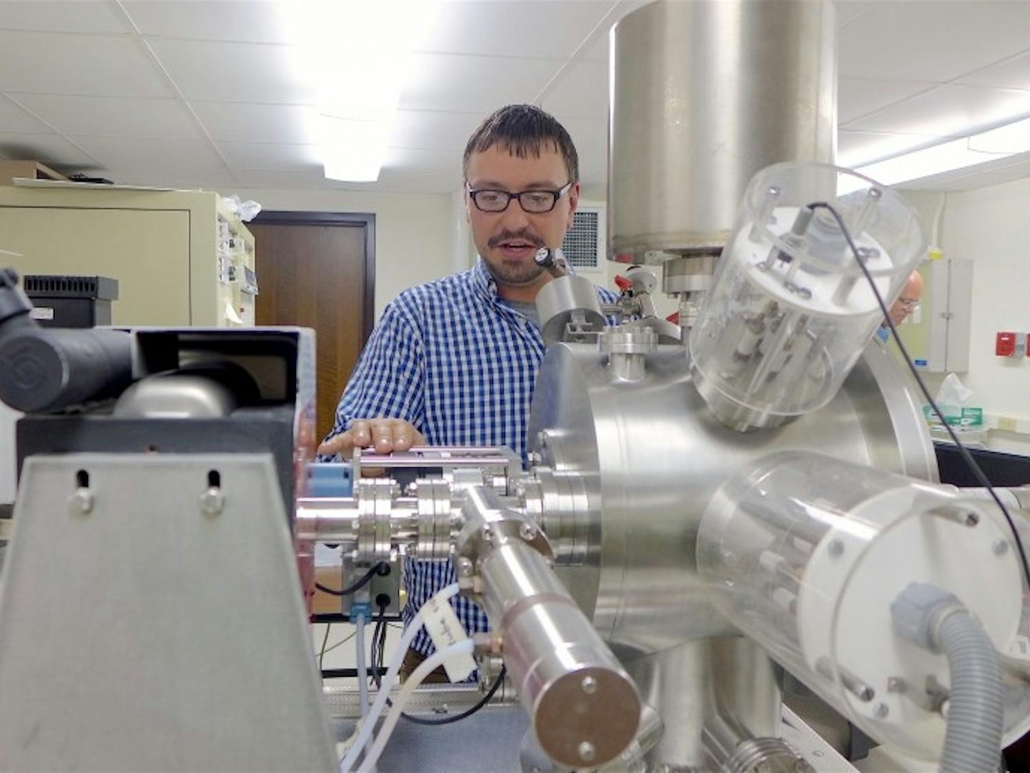 Aaron Satkoski used the UW-Madison Department of Geoscience's mass spectrometer to measure isotopes in samples collected from South Africa.