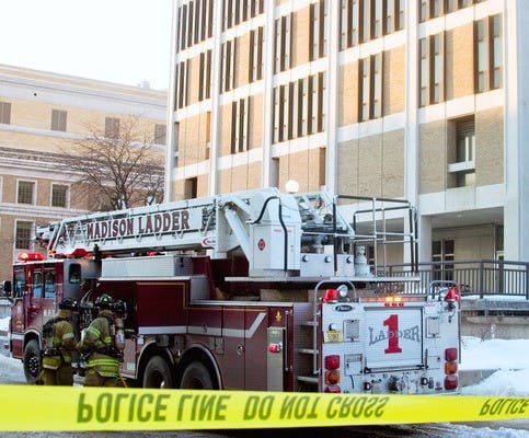 UW building evacuated over acid spill