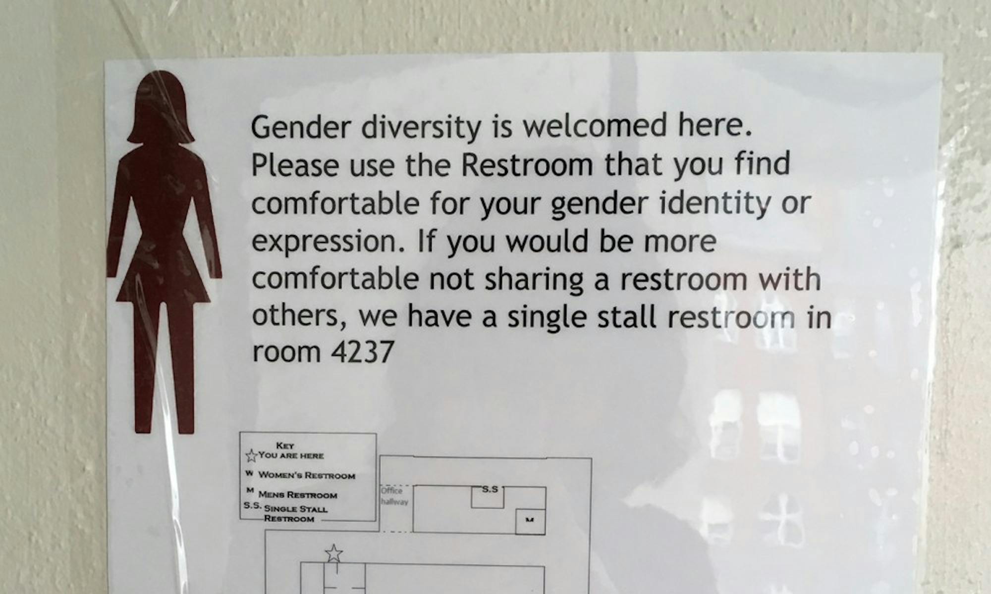 The LGBT Campus Center created a template to serve as a model for signs such as this, which is placed next to what was previously labeled a women’s restroom on the fourth floor of Helen C. White Hall.